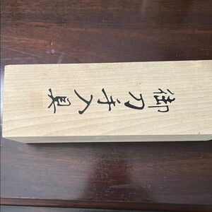 Carved Wooden Figurine in Box